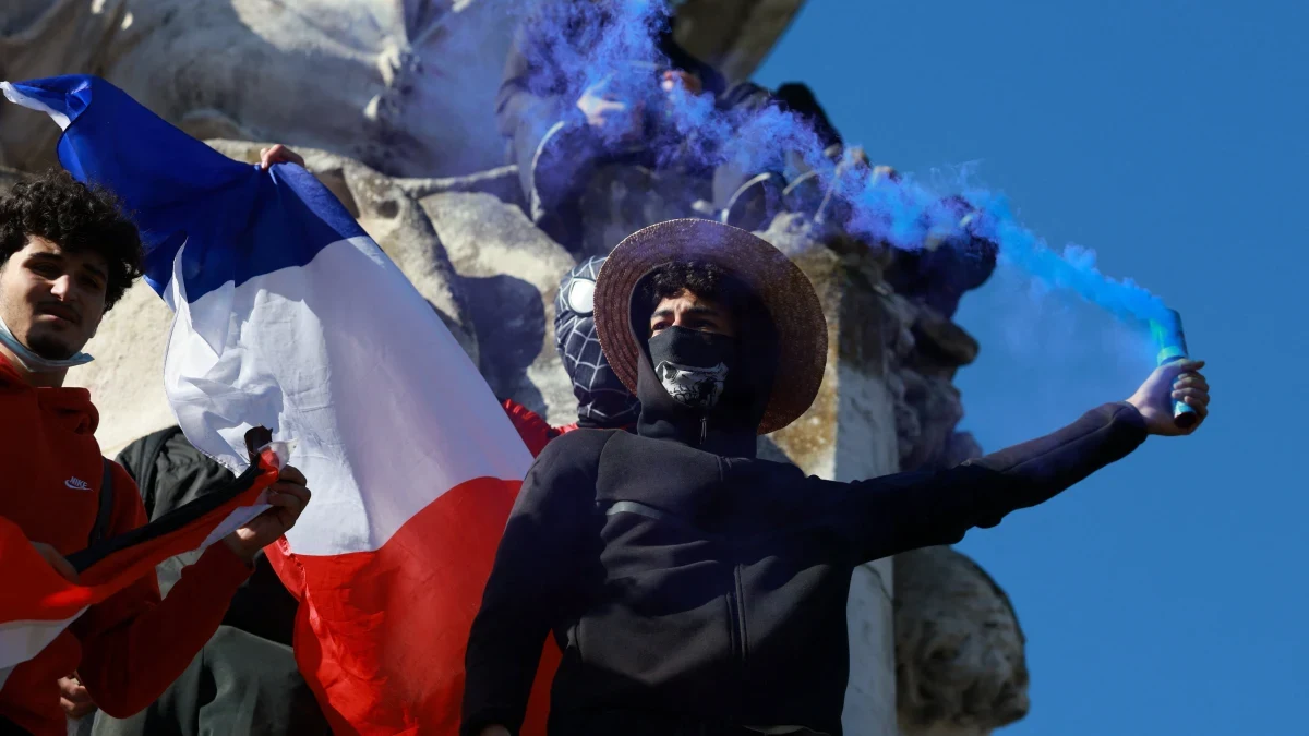 File photo: French police clash with protesters as thousands rally over cost ...